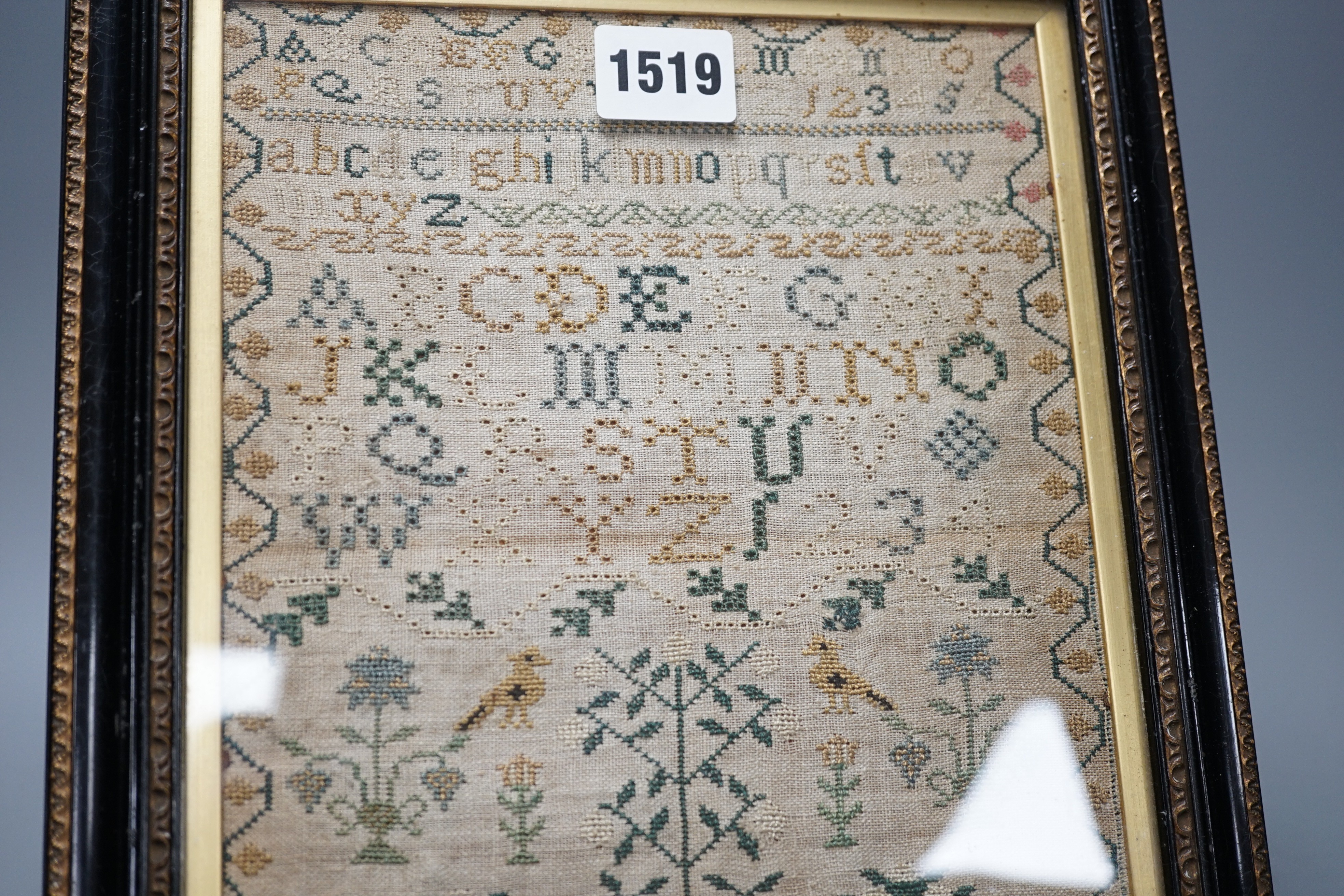 A George III sampler by Mary Bull, dated July 23 1799, 18cms wide x 23.5 high